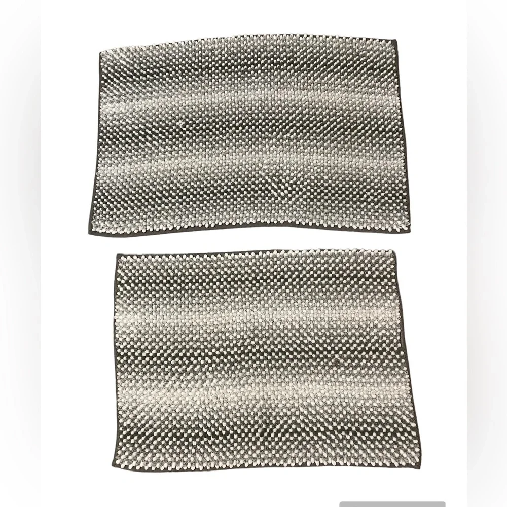 Grey and white bath mats